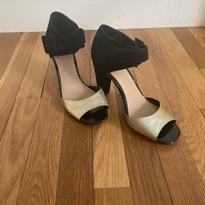 Black and gold heels